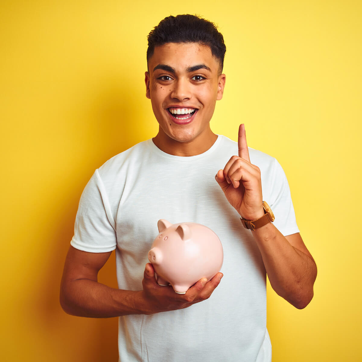 Man holding piggy bank