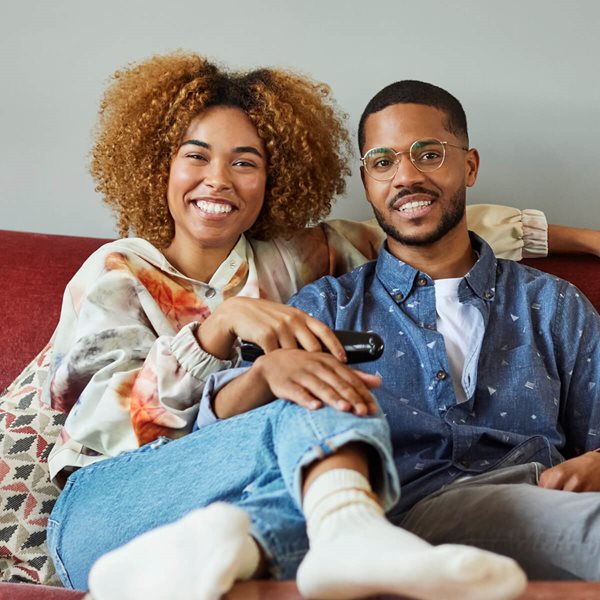 Couple looking at laptop