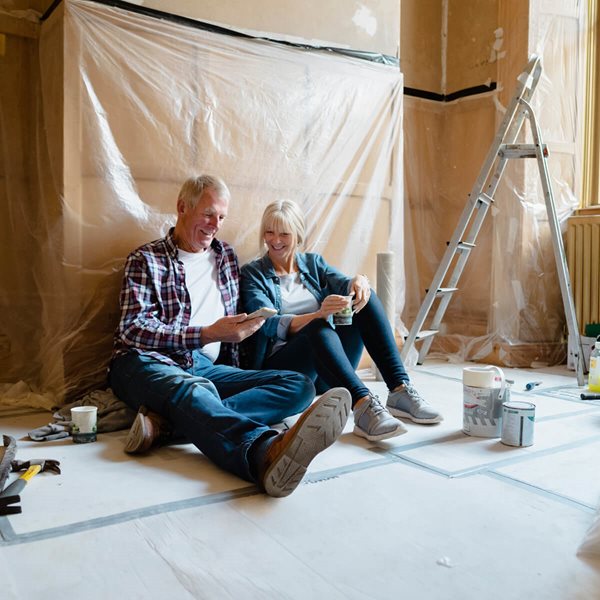 Icicles on damages gutters of house