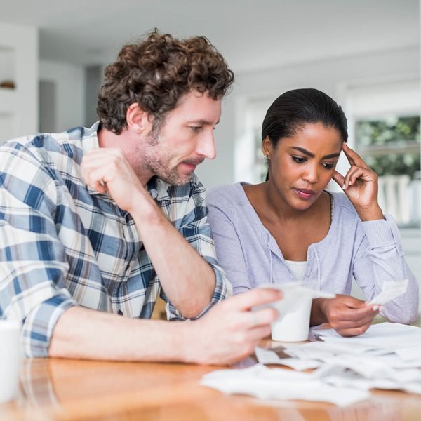 Couple looking at receipts