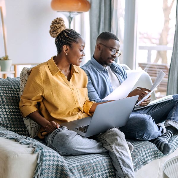 Couple looking at laptop